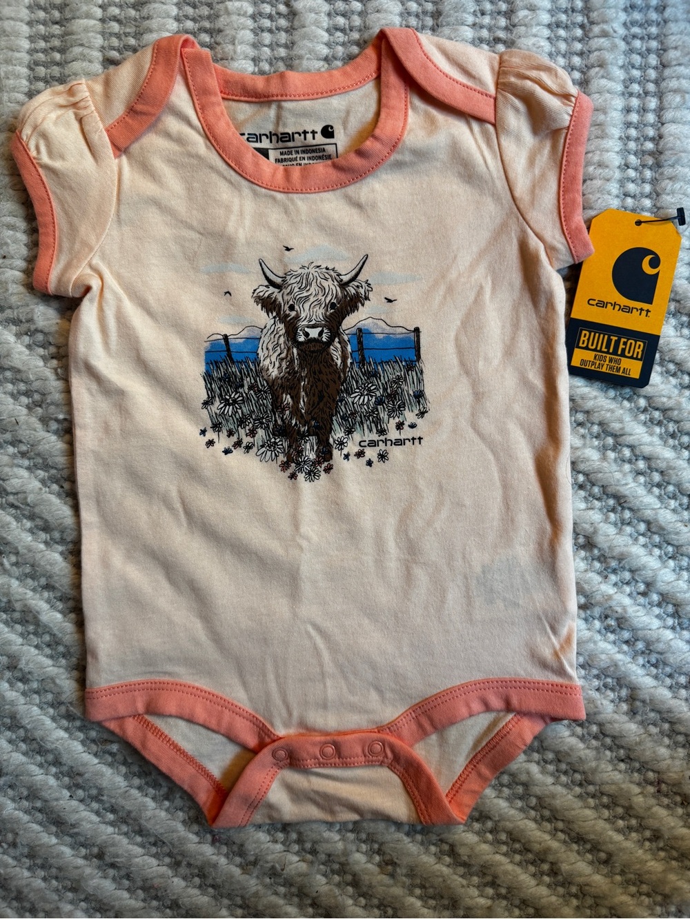 Carhartt Peach and Coral Infant Bodysuit with Highland Cow Graphic